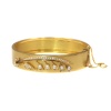 Antique gold bangle with lily of the valley motive